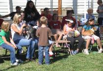 Children Participate in the Dog Show at the Fair